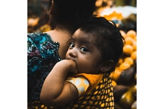 Image Baby and mother at market in Guatemala